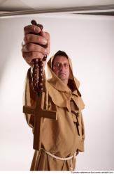 JOEL_ADAMSON MONK WITH CRUCIFIX